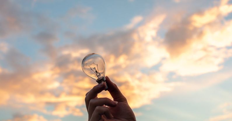 Innovation Lightbulb - Person Holding Clear Light Bulb