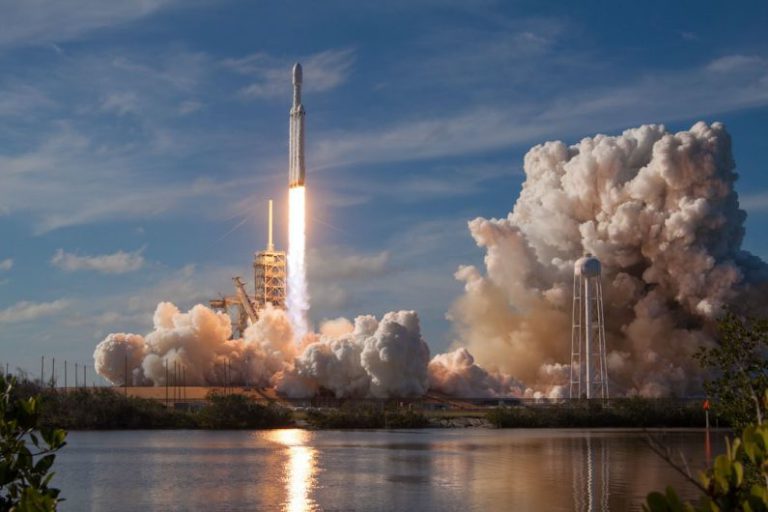 Space Technology - gray spacecraft taking off during daytime