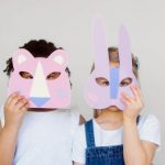 VR Creation - Two Kids Covering Their Faces With a Cutout Animal Mask