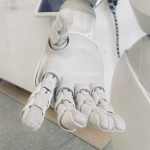 AI Healthcare - closeup photo of white robot arm