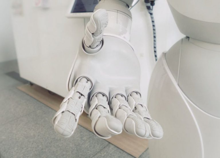 AI Healthcare - closeup photo of white robot arm