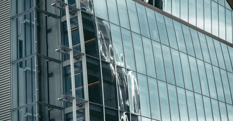 Economic Growth - Blue Grey Steel and Glass Skyscraper under Construction