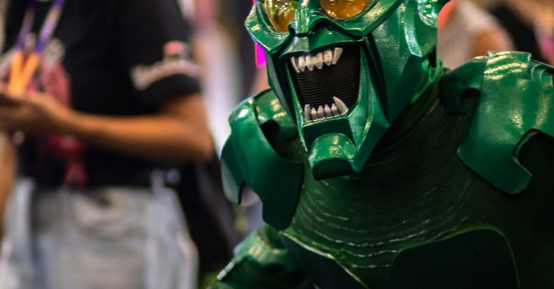 Cosmic Radiation - A man dressed as a green monster in a convention