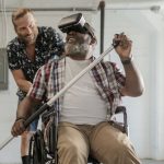 VR Gaming - Man paddling while wearing Virtual Reality Glasses