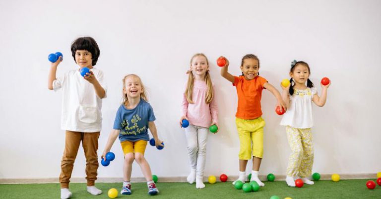 Indie Games - Little Girls and Boys Having Fun Playing With Colorful Balls