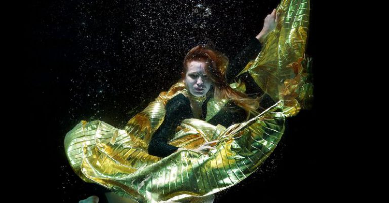 Gaming Life Balance - Underwater Photo of Woman Wearing Green and Black Dress