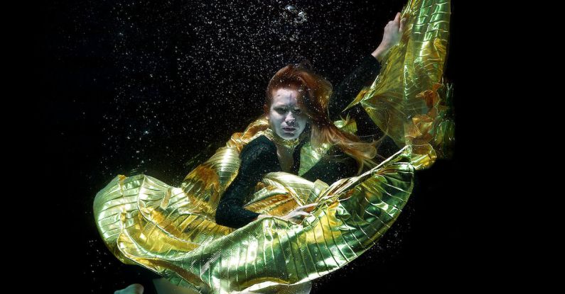 Gaming Life Balance - Underwater Photo of Woman Wearing Green and Black Dress