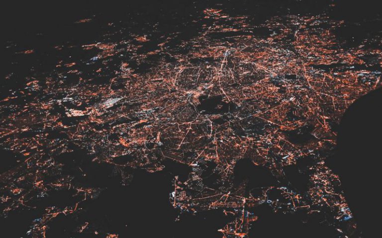 5G Network - lighted city at night aerial photo