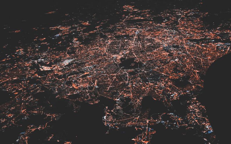 5G Network - lighted city at night aerial photo