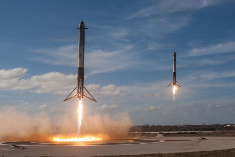 SpaceX Launch - twom white flying rockets during daytime