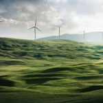 Clean Energy - wind turbine surrounded by grass