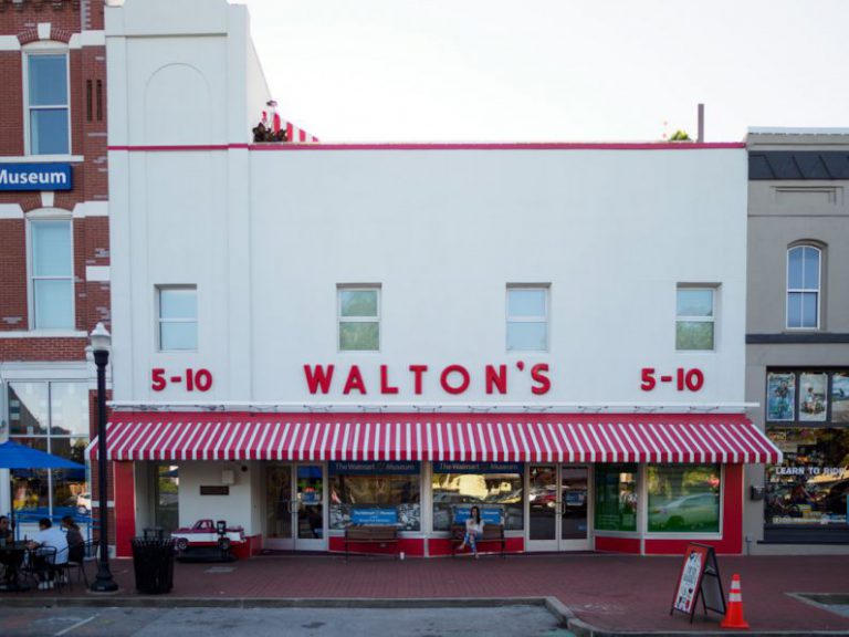 AR Shopping - a store front with a red and white awning