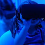 VR Classroom - girl using VR goggles